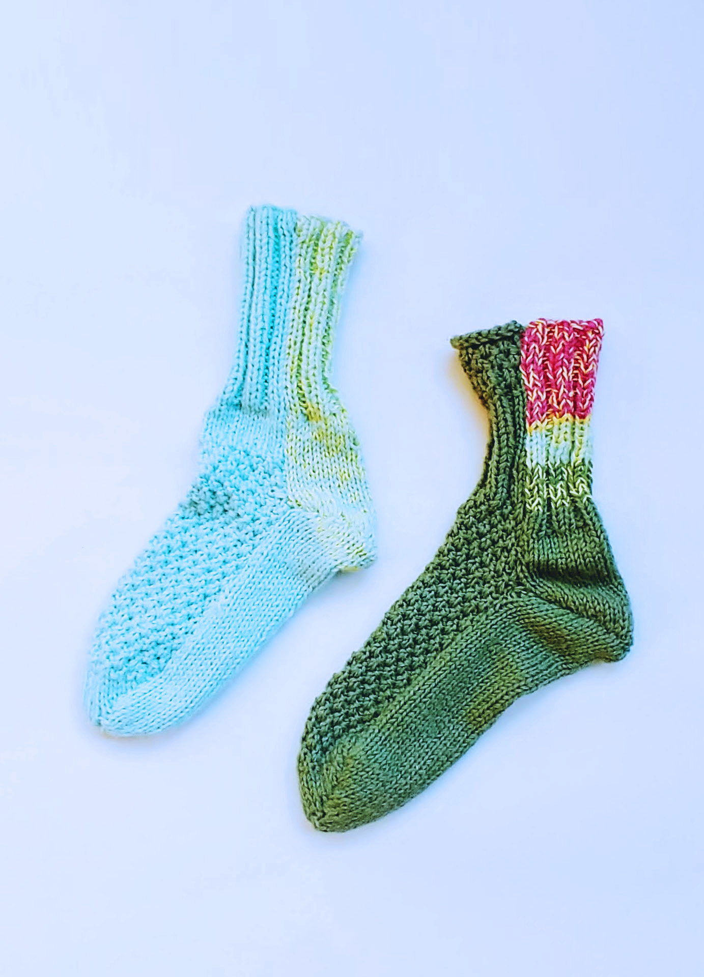 Two Knitted Socks - Blue and Green